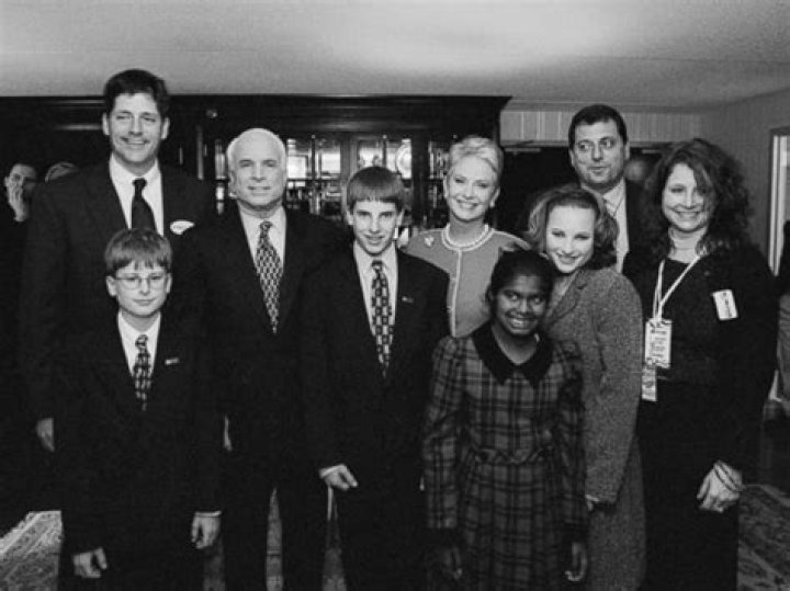 Who were John McCain's siblings?
