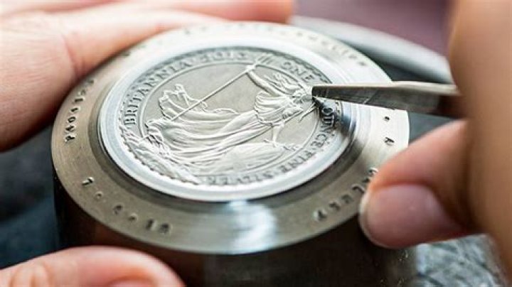 Why are metals used to make coins?