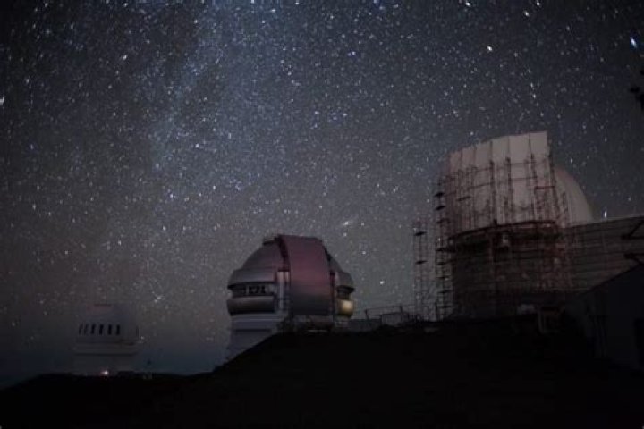 Why are observatories built on mountain tops?