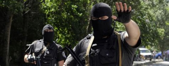 Why do armed police wear balaclavas?