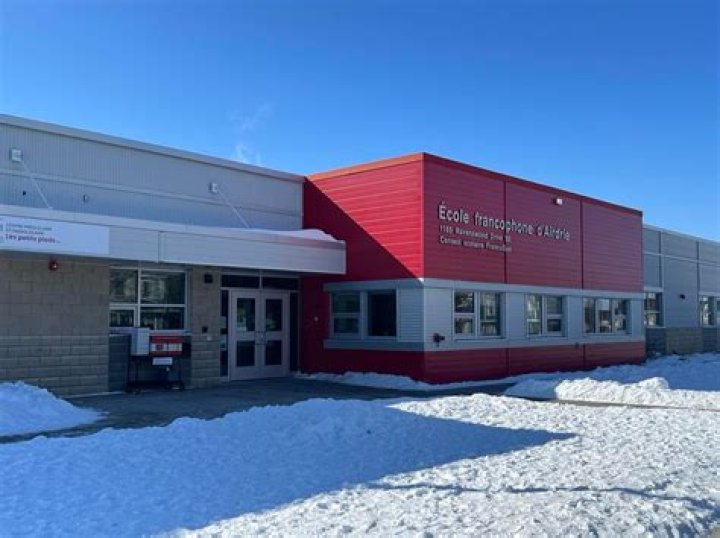 Why do Francophone schools exist in Alberta?