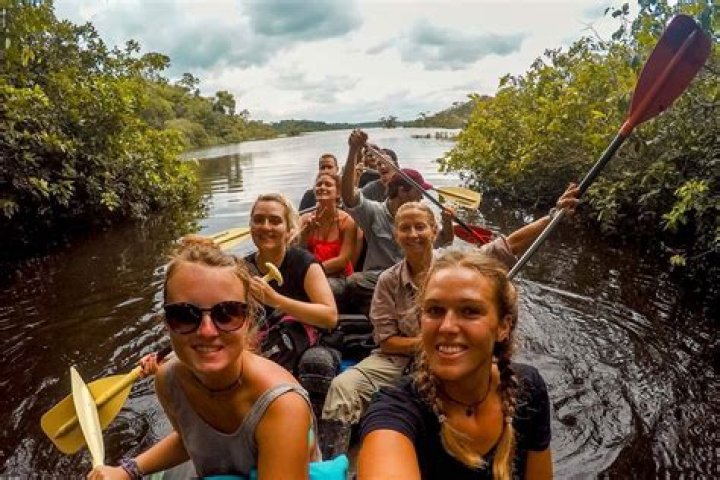 Why do tourists go to Brazil?