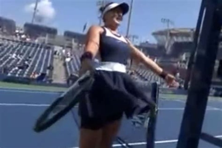 Why does Andreescu wear on her arm?