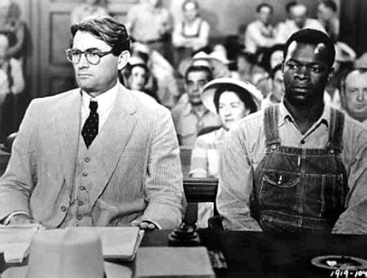 Why does Atticus not bring a chair for the man in the corner?