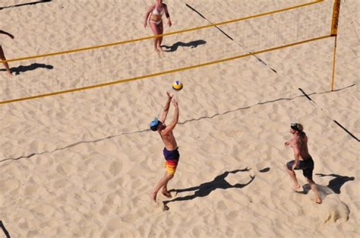 Why does beach volleyball only have 2 players?