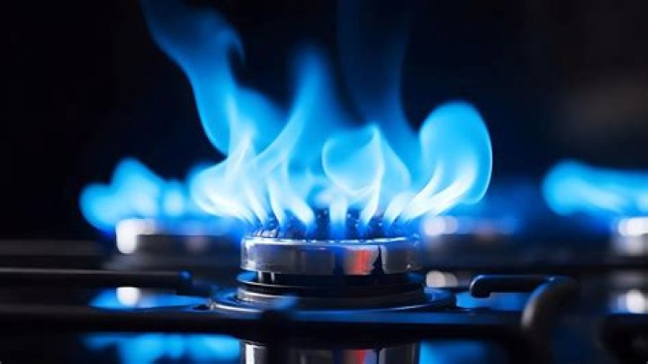 Why does LPG burn with blue flame?