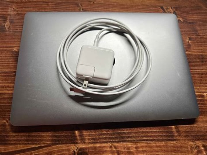Why is my MacBook charger cord yellow?